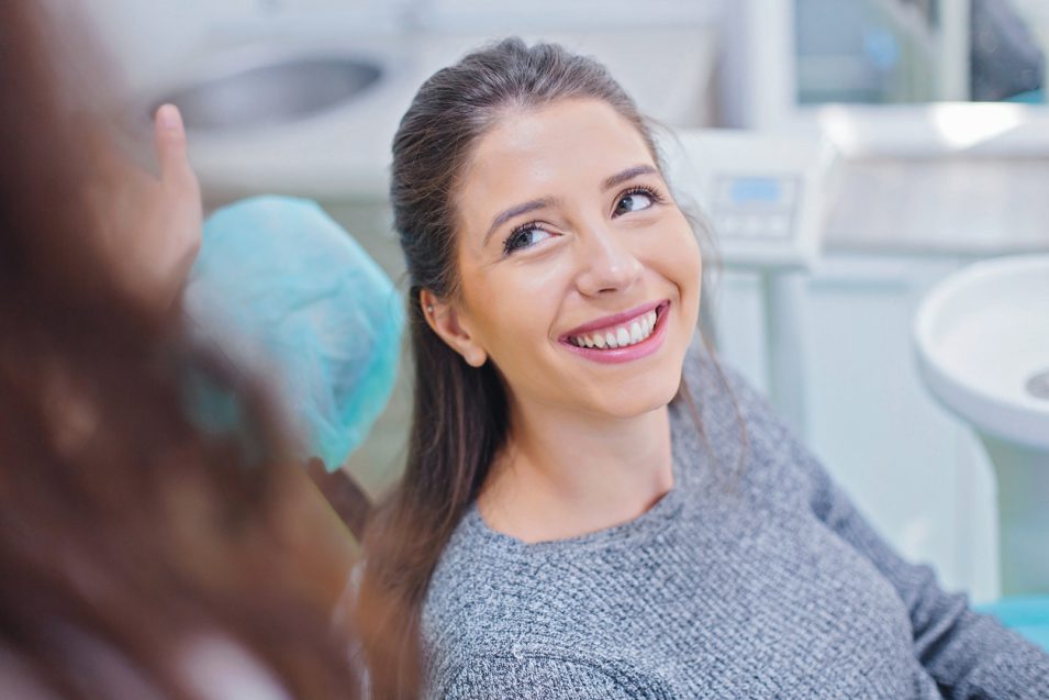 Patient happy after getting dental fillings from nearby clinic