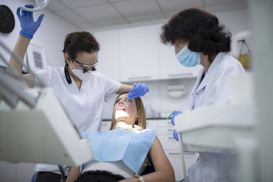 Patient having dental hygiene treatment in North York