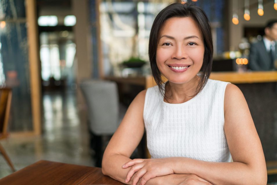 Lady smiling after getting dental implants in North York