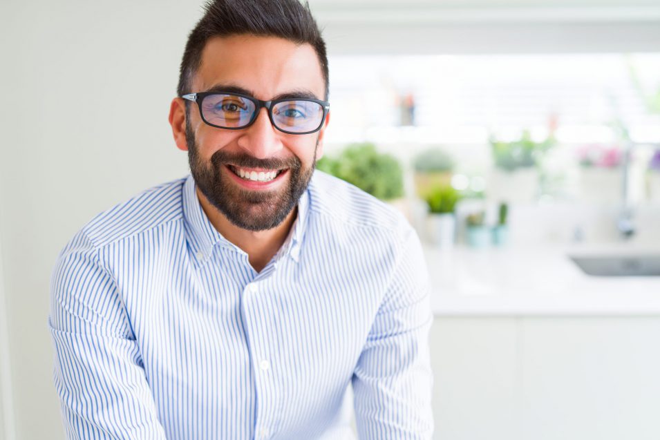 Man smiling after getting root canal in North York