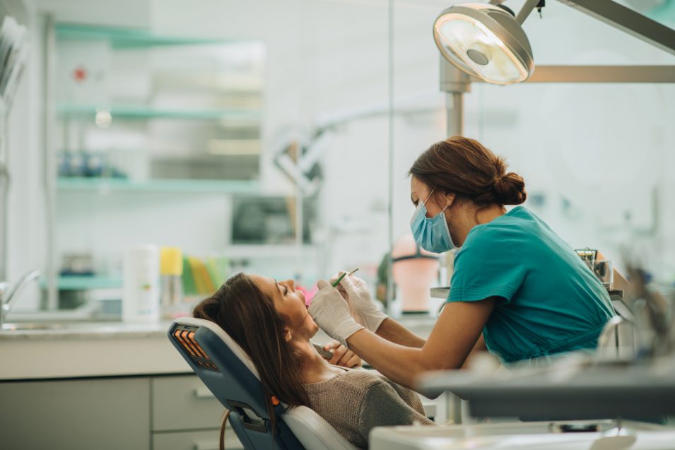 Patient getting root canals in nearby dental clinic