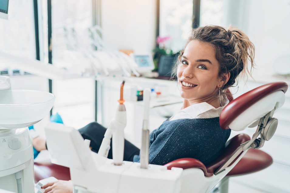 Women smiling after getting teeth whitening nearby